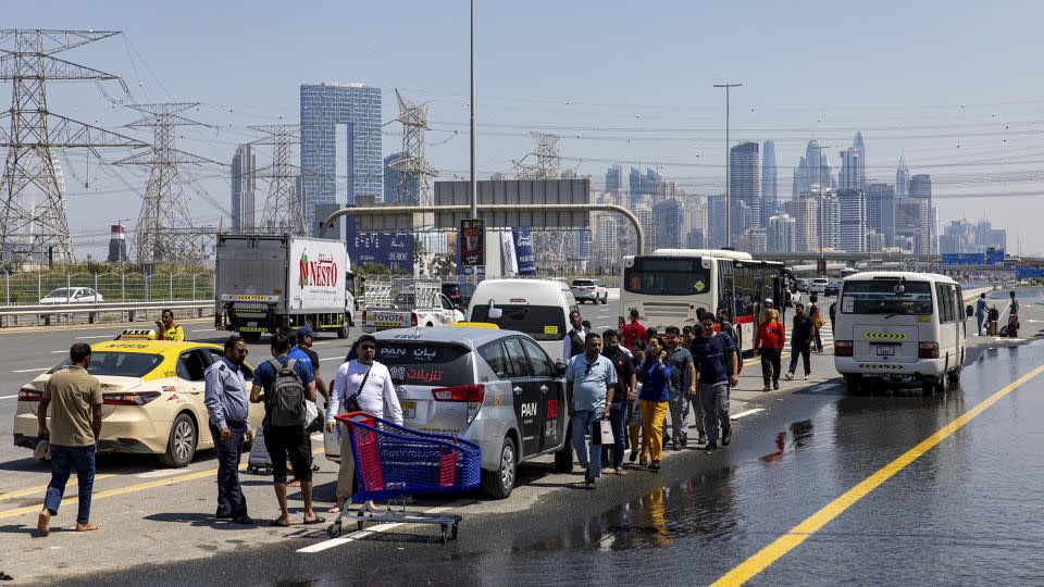 Flood roads left motorists stranded in Dubai. - Christopher Pike/AP