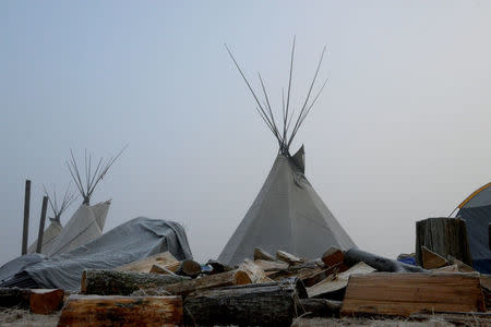 The Oceti Sakowin is seen in the morning shrouded in mist during a protest against the Dakota Access pipeline near the Standing Rock Indian Reservation near Cannon Ball, North Dakota, U.S. November 11, 2016. REUTERS/Stephanie Keith