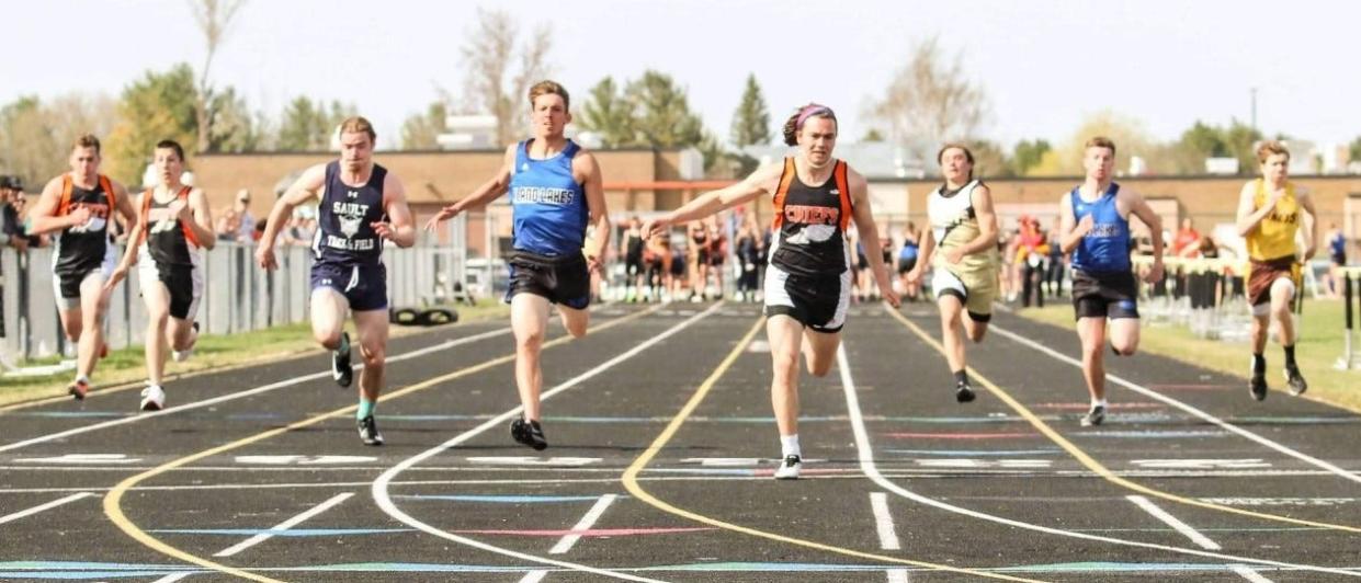 Cheboygan's Keegan Mosher (middle right) and Inland Lakes' Sam Mayer (middle left) finish up during a 100-meter run event at the Cheboygan Invitational from this past season. Both athletes found themselves on this year's Daily Tribune all-area track and field team.