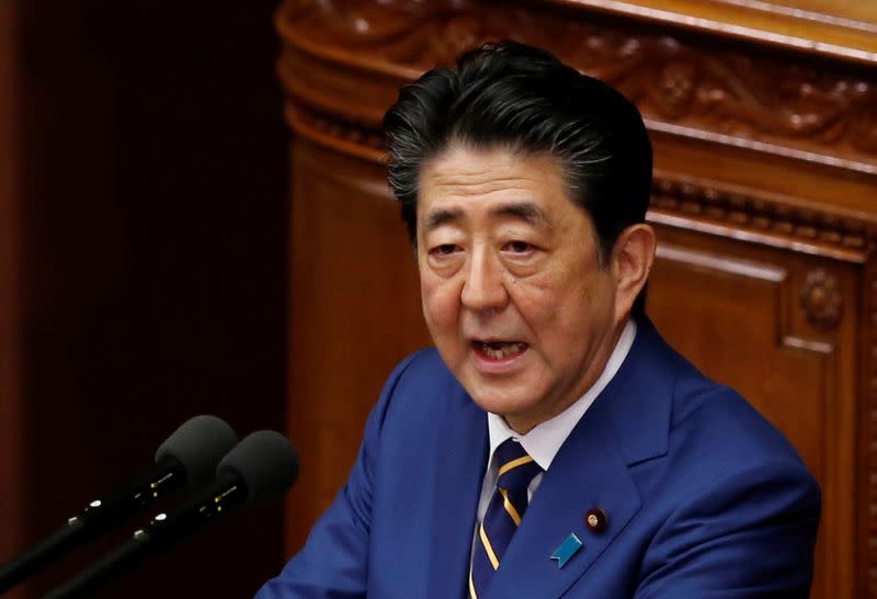 Japanese Prime Minister Shinzo Abe gives a policy speech at the start of the regular session of parliament in Tokyo