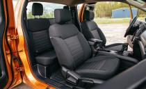 <p>The SuperCab's rear seats may be a penalty box, but its front seats are comfortable. Our test vehicle's optional vinyl floor matting in place of the standard carpet lent it a basic feel.</p>
