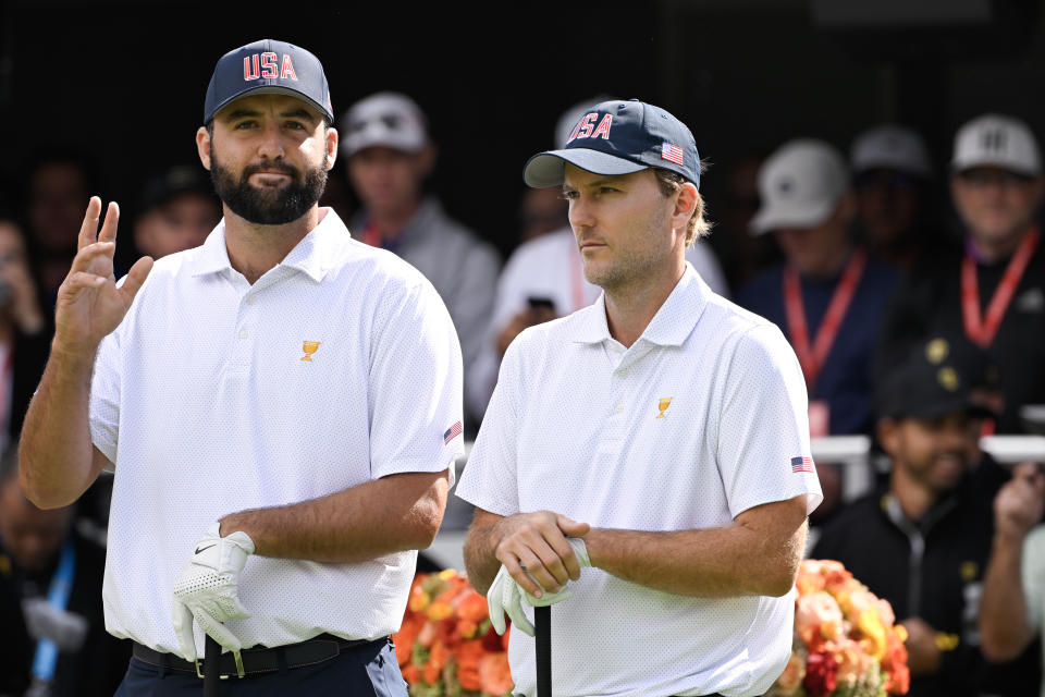 MONTREAL, QUEBEC - SEPTEMBER 26: Scottie Scheffler of the US team and Russell Henley of the US team stand on the first tee during Four-Ball on day one of the 2024 Presidents Cup at the Royal Montreal Golf Club on September 26, 2024 in Montreal, Quebec. (Photo by Ben Jared/PGA TOUR via Getty Images)