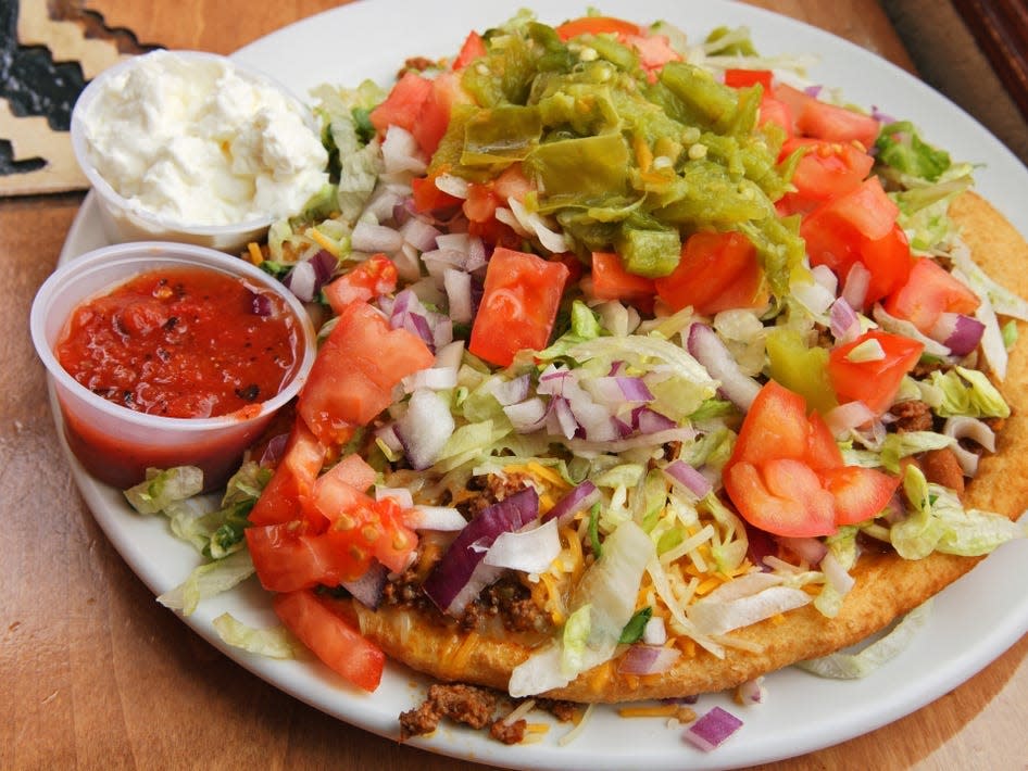 frybread tacos with salsa and sour cream