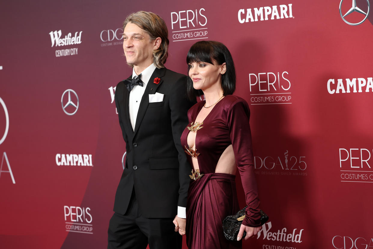 Mark Hampton and Christina Ricci attend the 25th Annual Costume Designers Guild Awards at Fairmont Century Plaza on February 27, 2023 in Los Angeles, California