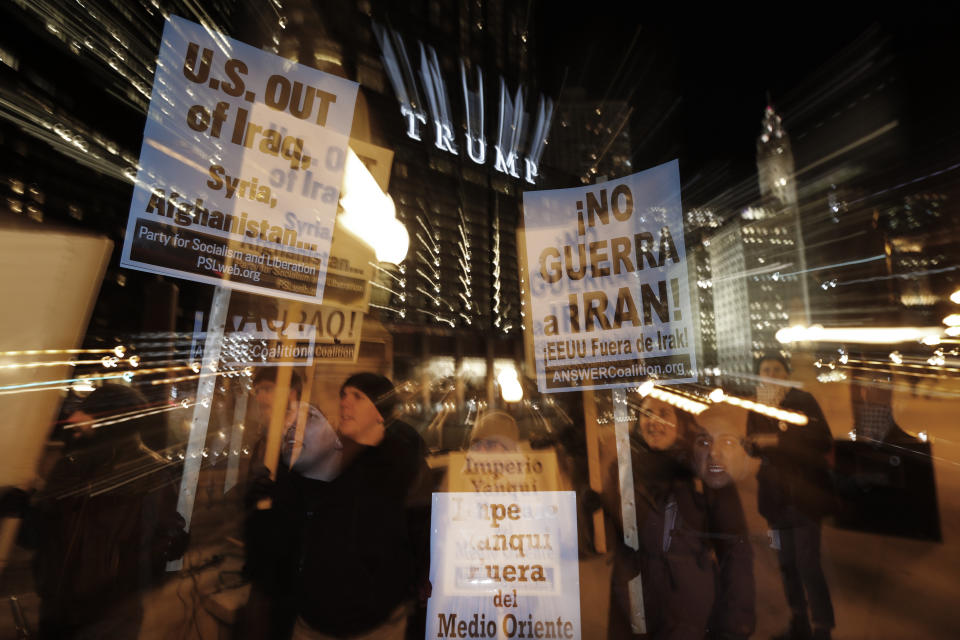 FILE - In this Jan. 8, 2020, file photo, protesters of President Donald Trump's military action in Iraq gather across the Chicago River from the Trump Tower in Chicago. Three years after Trump took office and millions of people swarmed to the Women’s March in Washington and companion marches across the country, these typically modest protests are often the most visible sign of today’s Trump resistance. (AP Photo/Charles Rex Arbogast, File)