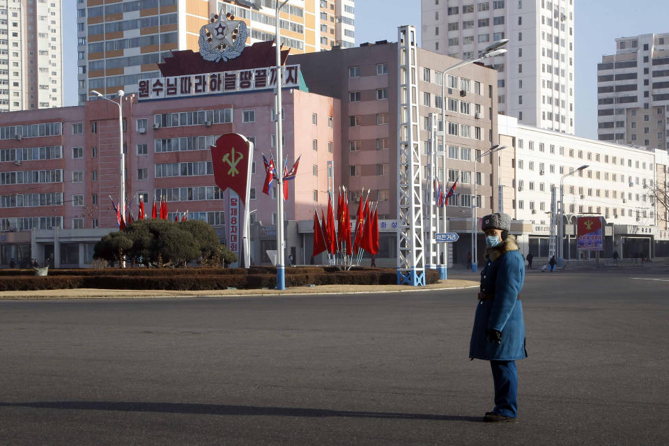 A traffic officer stand in attention along a main street of the Central District in Pyongyang, North Korea, on Wednesday, Jan. 6, 2021. The Workers’ Party Congress is one of the North’s biggest propaganda spectacles and is meant to help leader Kim Jong Un show his people that he’s firmly in control and boost unity in the face of COVID-19 and other growing economic challenges. (AP Photo/Jon Chol Jin)
