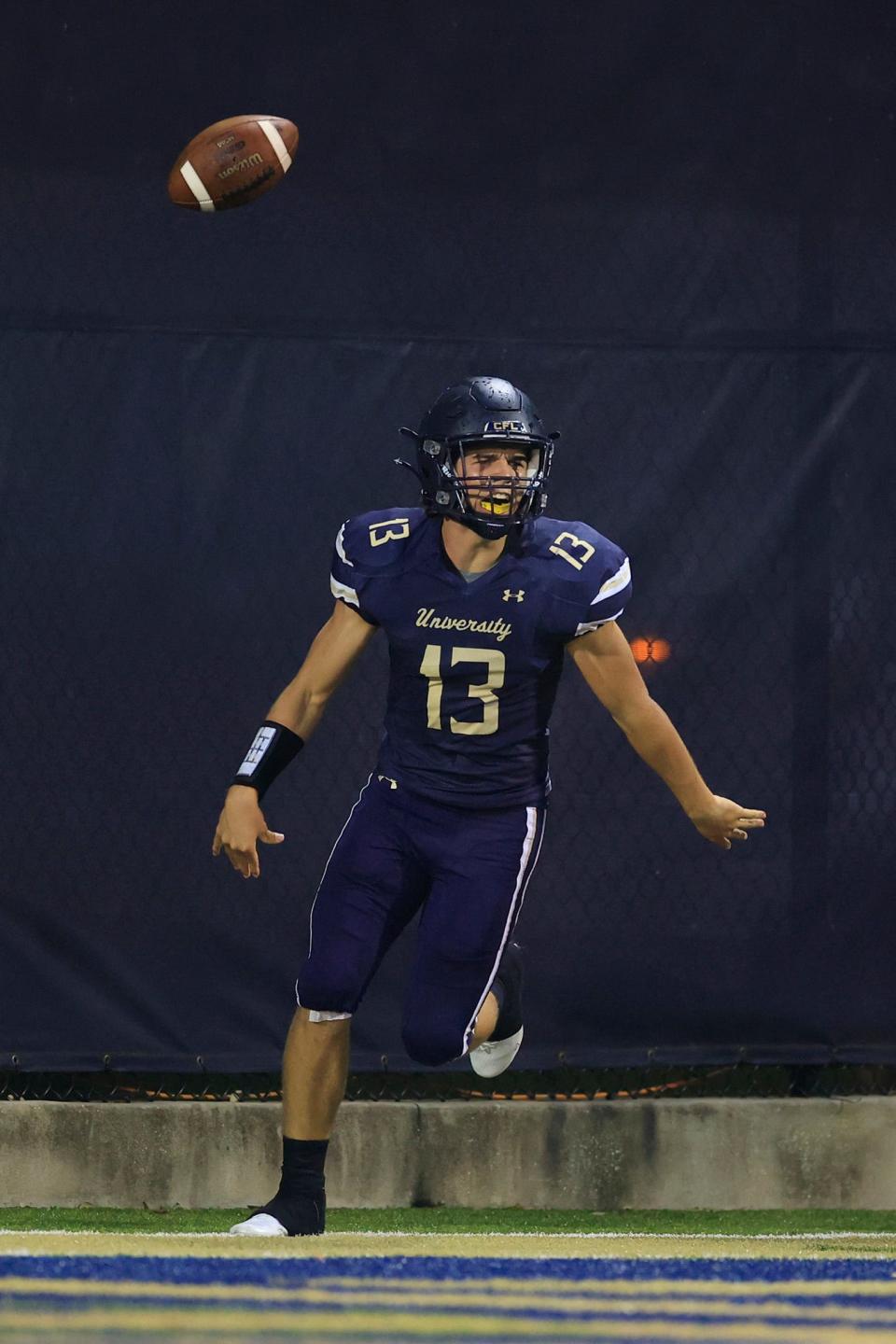 University Christian's Brady Wright #13 scores a touchdownduring the first quarter of a regular season high school football game Friday, Aug. 26, 2022 at University Christian School in Jacksonville. The University Christian Fightin' Christians are No. 3 overall in the first FHSAA rankings.