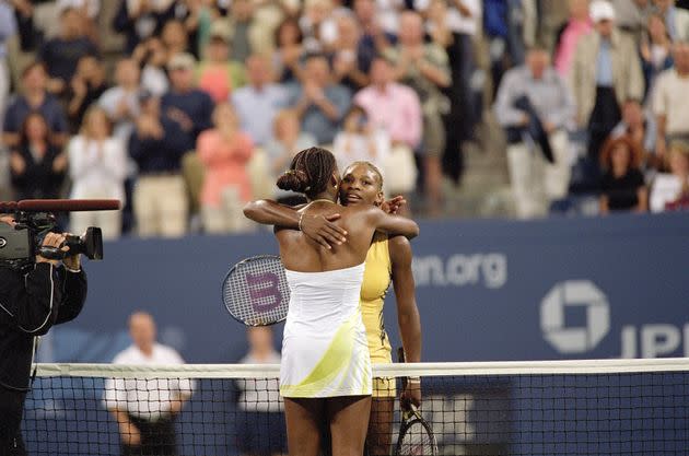 Williams and her sister Venus Williams hug at a tennis facility in New York City on Sept. 8, 2001. (Photo: Manny Millan via Getty Images)