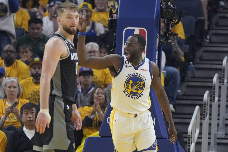 Draymond Green came off the bench for Game 4 and almost immediately got into it with D'Aaron Fox. (AP Photo/Jeff Chiu)