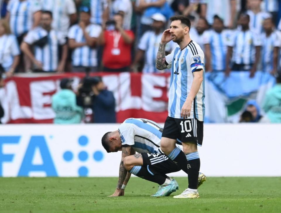 阿根廷爆冷輸給沙烏地，梅西一臉落寞。（路透）