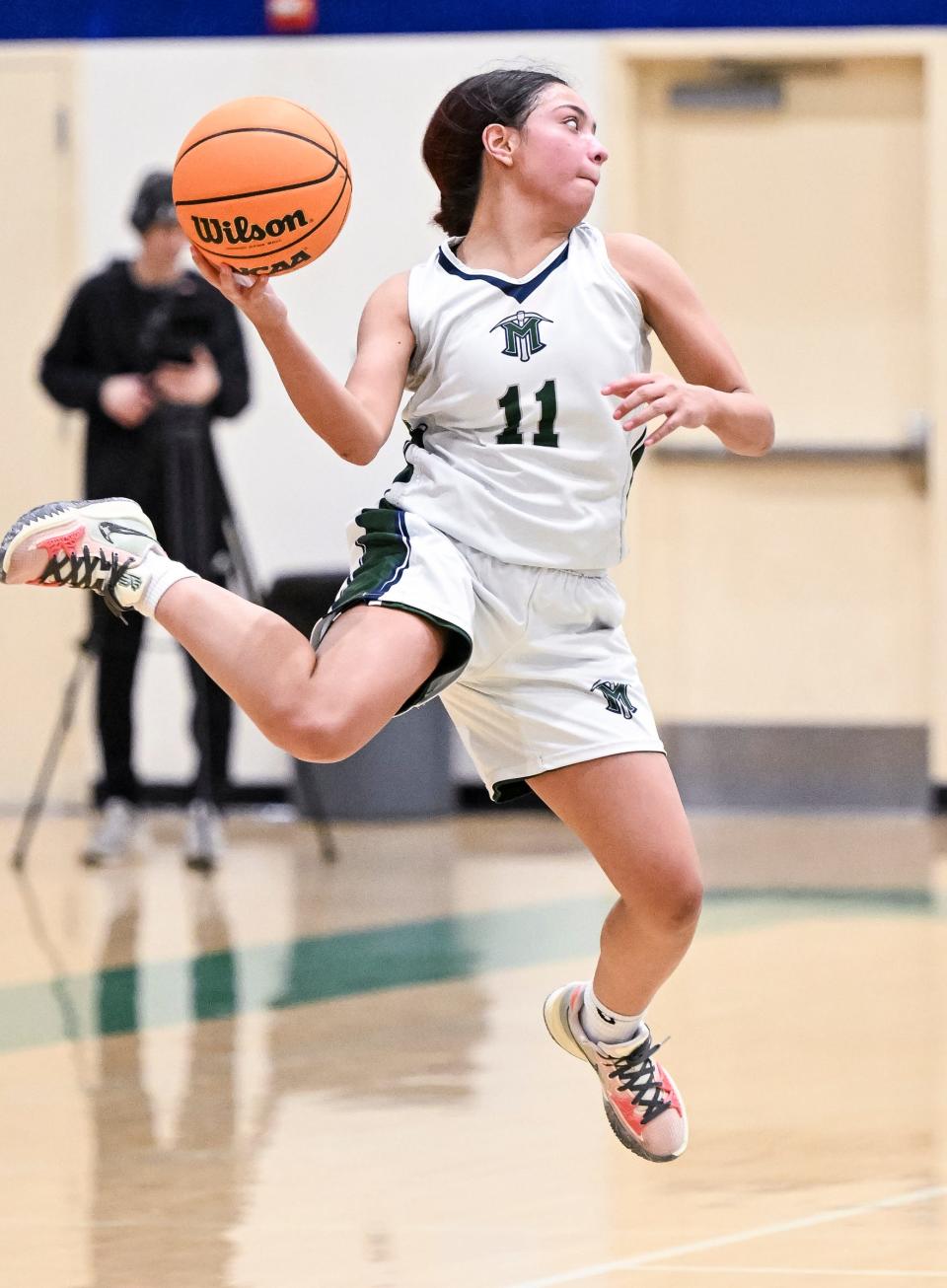 El Diamante's Nevaeh Creason passes against Monache in an East Yosemite League high school girls basketball game Friday, January 13, 2023.