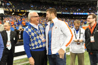 University of Florida president Bernie Machen (left) and former Gators quarterback Tim Tebow (right) at the 2013 Allstate Sugar Bowl in New Orleans on Jan. 2, 2013. The Louisville Cardinals beat Florida, 33-23, in the 79th annual bowl game. (Cheryl Gerber/AP Images for Allstate)