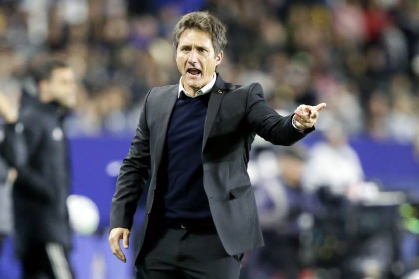 LA Galaxy head coach Guillermo Barros Schelotto reacts to a sideline judges call during the first.