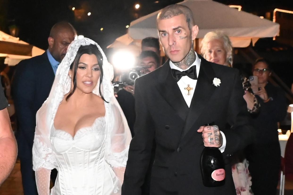 Portofino, ITALY - Kourtney Kardashian and Travis Barker get married in Portofino. Pictured: Kourtney Kardashian, Travis Barker BACKGRID USA 22 MAY 2022 BYLINE MUST READ: Cobra Team / BACKGRID USA: +1 310 798 9111 / usasales@backgrid.com UK: +44 208 344 2007 / uksales@backgrid.com *UK Clients - Pictures Containing Children Please Pixelate Face Prior To Publication*