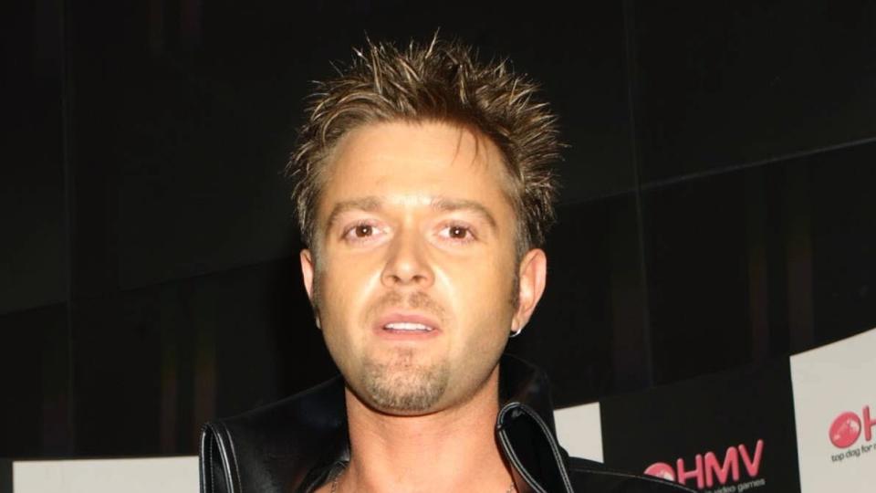 Darren Day performing on stage at HMV in Oxford Street (PA)