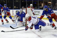 Montreal Canadiens right wing Evgenii Dadonov (63) shoots against New York Rangers goaltender Igor Shesterkin (31) in the third period of an NHL hockey game Sunday, Jan. 15, 2023, in New York. (AP Photo/Adam Hunger)