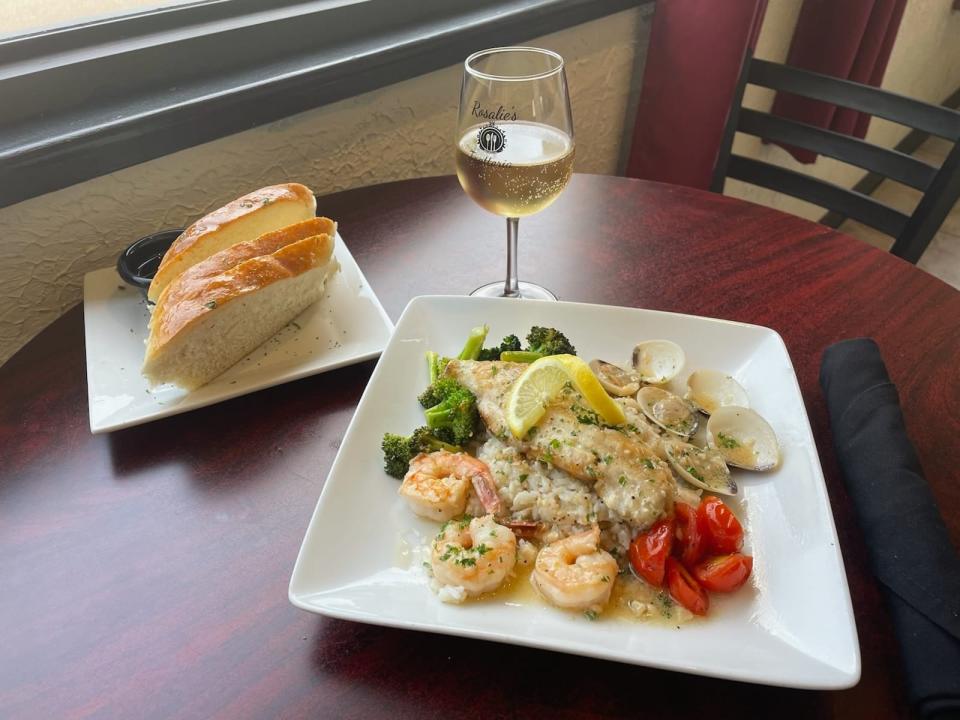 At Rosalie's Trattoria in Wilmington, the grouper with shrimp and clams over cilantro rice is an option for Valentine's Day.