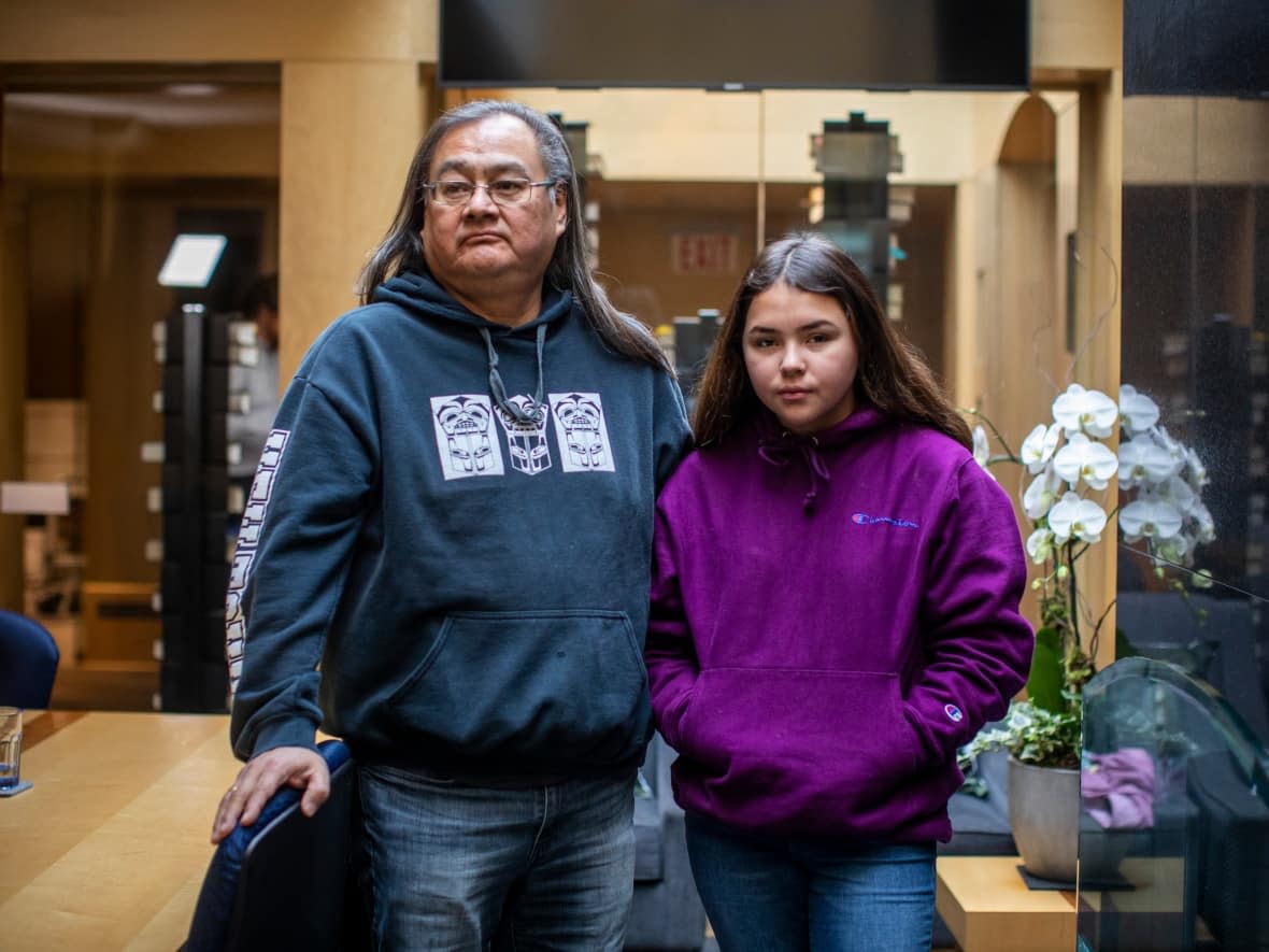 Maxwell Johnson was trying to open an account for his granddaughter so he could transfer her money while she was on the road for basketball games. (Ben Nelms/CBC - image credit)