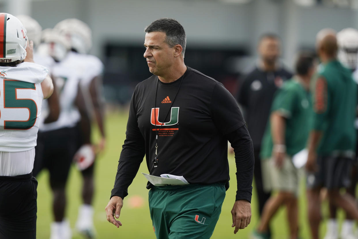 Miami head coach Mario Cristobal is in his first year as the Hurricanes' head coach after he left Oregon in the offseason. (AP Photo/Marta Lavandier)