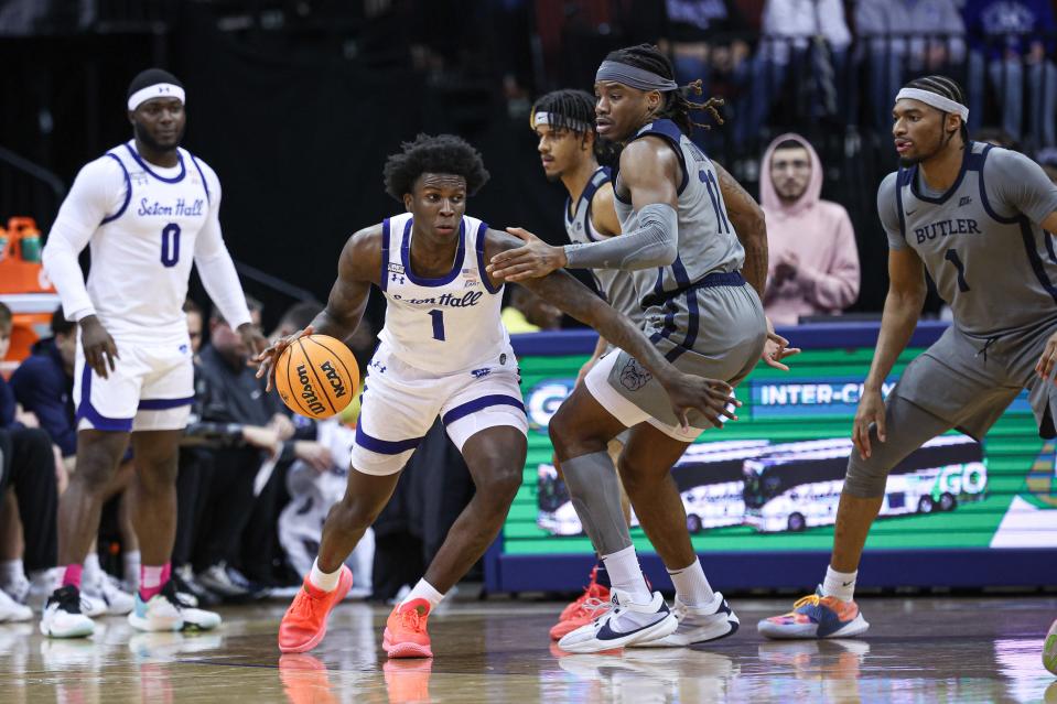 Feb 24, 2024; Newark, New Jersey, USA; Seton Hall Pirates guard Kadary Richmond (1) dribbles against Butler Bulldogs guard Jahmyl Telfort (11) during the first half at Prudential Center. Mandatory Credit: Vincent Carchietta-USA TODAY Sports