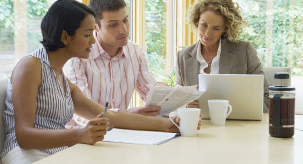 Couple Meeting With Financial Advisor