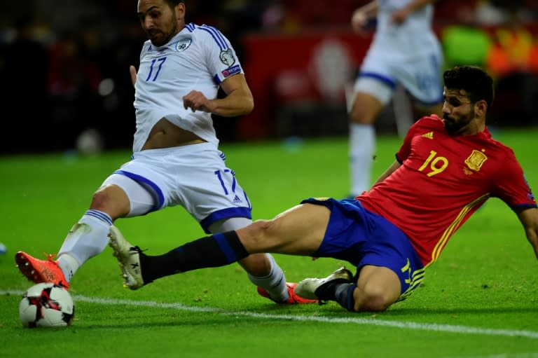 Spain's forward Diego Costa (R) vies with Israel's defender Shir Tzedek during the WC 2018 group G football qualifing match March 24, 2017