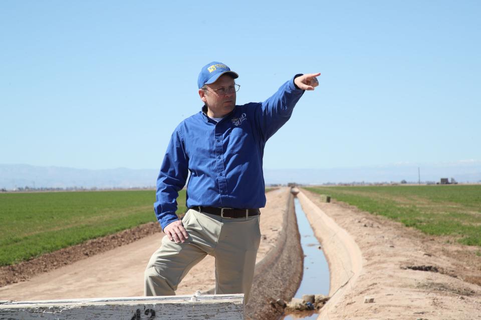 Ben Brock, IID's senior program manager for on-farm conservation, talks about water on farmland in Imperial, Calif., March 2, 2023.