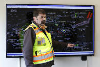 In this March 16, 2017 photo, Robert Waddle, division operations manager at the West Point Treatment Plant in Seattle, stands in front of a screen showing the operations of the sewage treatment plant that suffered a massive equipment failure that crippled operations and caused millions of gallons of raw sewage and untreated runoff to pour into the United States' second largest estuary. (AP Photo/Ted S. Warren)