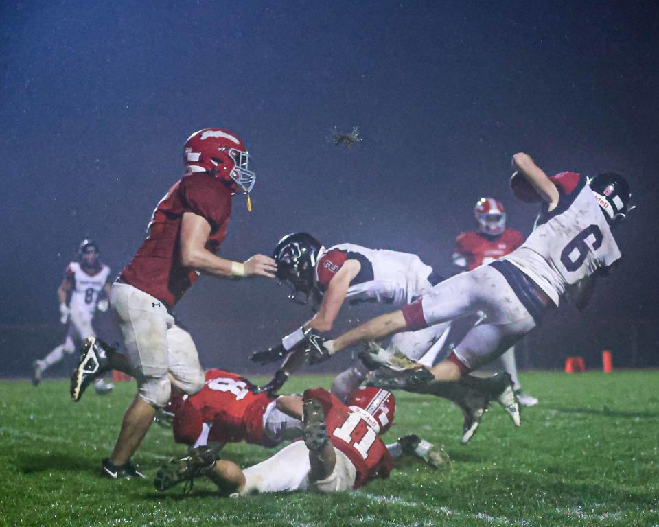 Bryce Keller (11) makes a big hit on Dominic Giuffre (6). Annville-Cleona played host to the Schuylkill Valley Panthers in a LL League Football game on Friday October 20, 2023. Schuylkill Valley beat Annville-Cleona, 14-13.