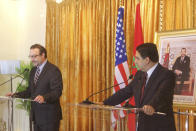 David Schenker, US Assistant Secretary of State for Near Eastern Affairs, left, speaks to journalists during a press briefing with Nasser Bourita, right, Moroccan Foreign Minister, in Dakhla, Morocco-administered Western Sahara, Sunday Jan. 10, 2021. The highest ranking U.S. diplomat for North Africa and the Middle East, as well as the first ever U.S Ambassador, traveled Sunday to the Morocco-administered Western Sahara city of Dakhla, laying the groundwork for the United States to set up a consulate in the disputed territory. (AP Photo/Noureddine Abakchou)