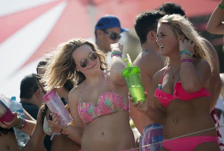 Spring breakers gather at a pool party at a hotel in Cancun March 14, 2015. REUTERS/Victor Ruiz Garcia