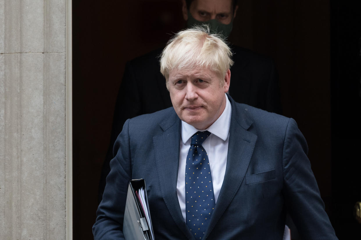 UK prime minister <span class="caas-xray-inline-tooltip"><span class="caas-xray-inline caas-xray-entity caas-xray-pill rapid-nonanchor-lt" data-entity-id="Boris_Johnson" data-ylk="cid:Boris_Johnson;pos:1;elmt:wiki;sec:pill-inline-entity;elm:pill-inline-text;itc:1;cat:Politician;" tabindex="0" aria-haspopup="dialog"><a href="https://search.yahoo.com/search?p=Boris%20Johnson" data-i13n="cid:Boris_Johnson;pos:1;elmt:wiki;sec:pill-inline-entity;elm:pill-inline-text;itc:1;cat:Politician;" tabindex="-1" data-ylk="slk:Boris Johnson;cid:Boris_Johnson;pos:1;elmt:wiki;sec:pill-inline-entity;elm:pill-inline-text;itc:1;cat:Politician;" class="link ">Boris Johnson</a></span></span> announced national insurance rates hike for both employees and employers on Tuesday. Photo: Wiktor Szymanowicz/Barcroft Media via Getty