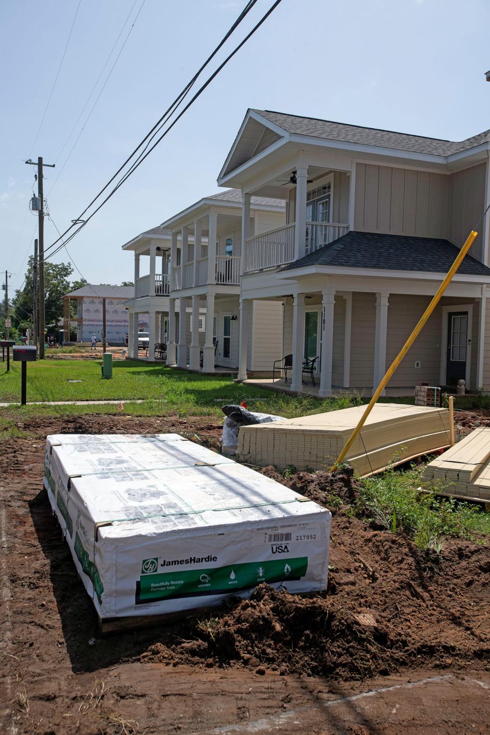 New homes and vacant lots for sale dot the downtown Pensacola landscape on Aug. 26.