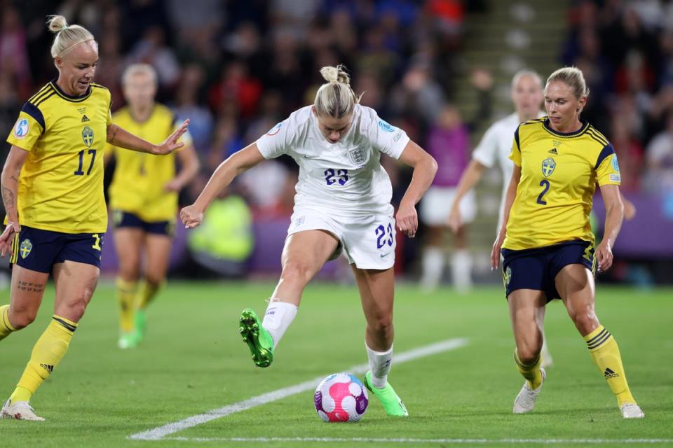 Alessia Russo of England scores  a sublime back heel third goal whilst under pressure from Caroline Seger and Jonna Andersson of Sweden (Getty Images)