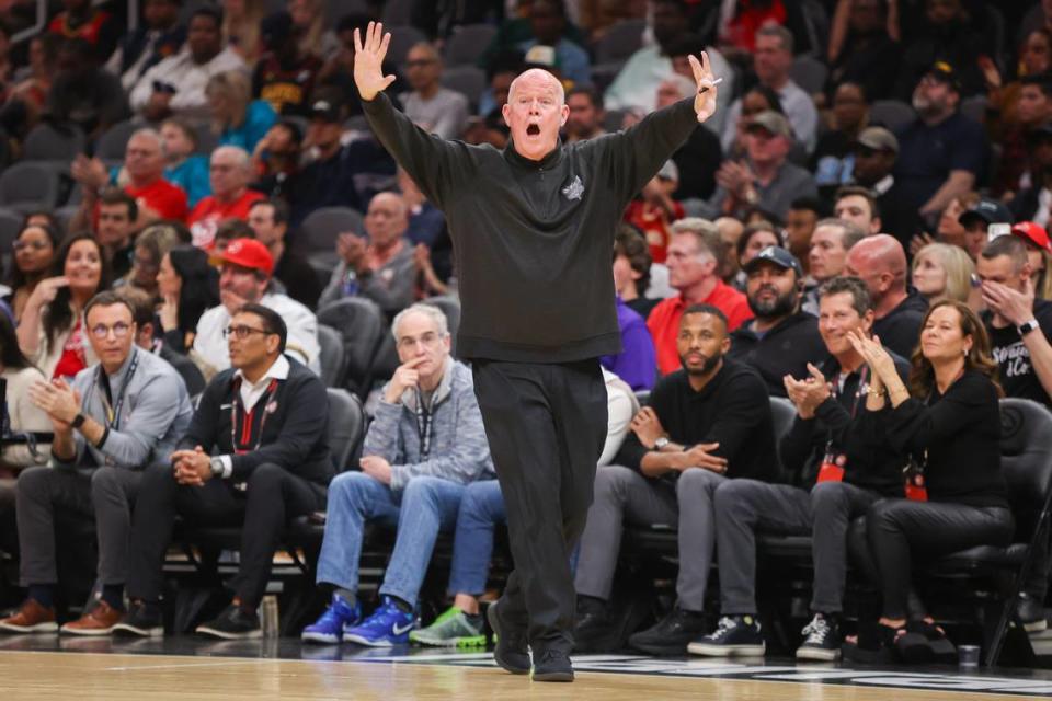 Charlotte Hornets head coach Steve Clifford talks to players against the Atlanta Hawks in the second quarter at State Farm Arena.