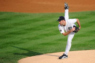 DETROIT, MI - OCTOBER 13: Justin Verlander #35 of the Detroit Tigers throws a pitch against the Detroit Tigers in the first inning of Game Five of the American League Championship Series at Comerica Park on October 13, 2011 in Detroit, Michigan. (Photo by Kevork Djansezian/Getty Images)