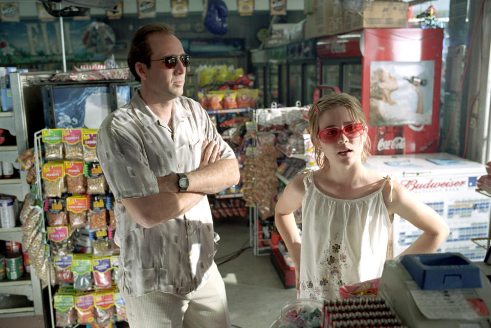 Nicolas Cage and Alison Lohman at a gas station.