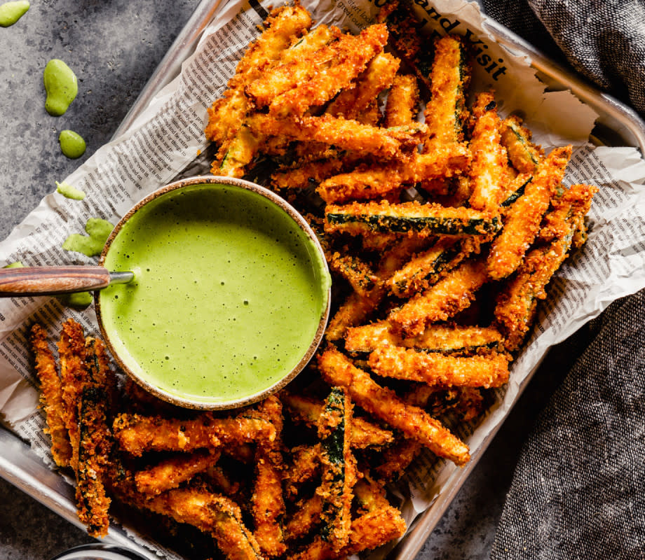 <p>Lauren Grant</p><p>Nothing beats a basket of crispy fries, and this low-carb version is a satisfying alternative. </p><p><strong>Get the recipe: <a href="https://parade.com/recipes/zucchini-fries" rel="nofollow noopener" target="_blank" data-ylk="slk:Zucchini Fries with Green Goddess Sauce;elm:context_link;itc:0;sec:content-canvas" class="link rapid-noclick-resp">Zucchini Fries with Green Goddess Sauce</a></strong></p>