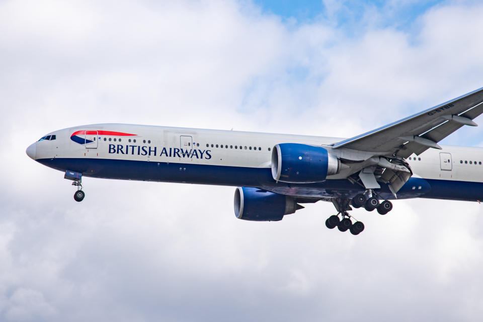 British Airways Boeing 777-300 Extended Range Edition aircraft specifically 777-36N (ER) as seen on final approach landing at London Heathrow International Airport LHR EGLL in England, UK over the houses of Myrtle Avenue on 29 October 2019. The B777 long-haul wide-body airplane has the registration G-STBB and 2x GE jet engines. British Airways BA BAW Speedbird is the flag carrier of the United Kingdom with main base hub Heathrow Airport. The airline has 278 airplanes, is a member of Oneworld aviation alliance and is owned by International Airlines Group IAG. (Photo by Nicolas Economou/NurPhoto via Getty Images)