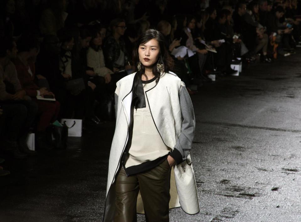 The Phillip Lim Fall 2013 collection is modeled during Fashion Week in New York on Monday, Feb. 11, 2013. (AP Photo/Lisa Tolin)