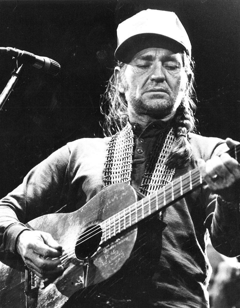Willie Nelson performs at the Taylor County Coliseum in the late 1970s. Nelson returns to Abilene on Saturday to headline the second day of the Outlaws & Legends Music Festival.