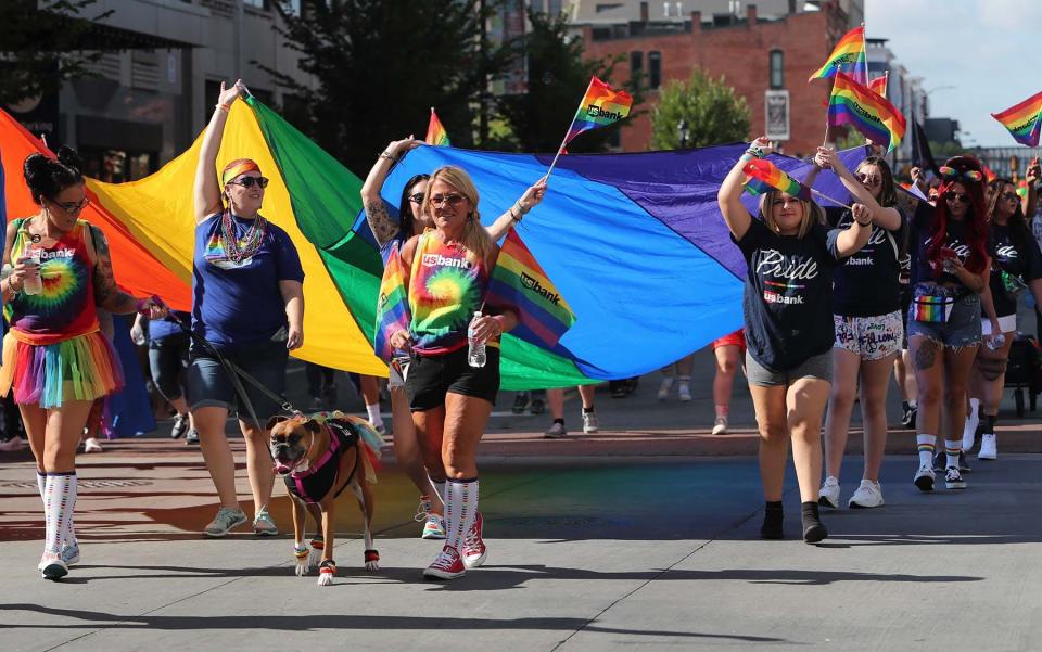 Employees of U.S. Bank participate in the Akron Equity March along South Main Street, presented by the J.M. Smucker Co.