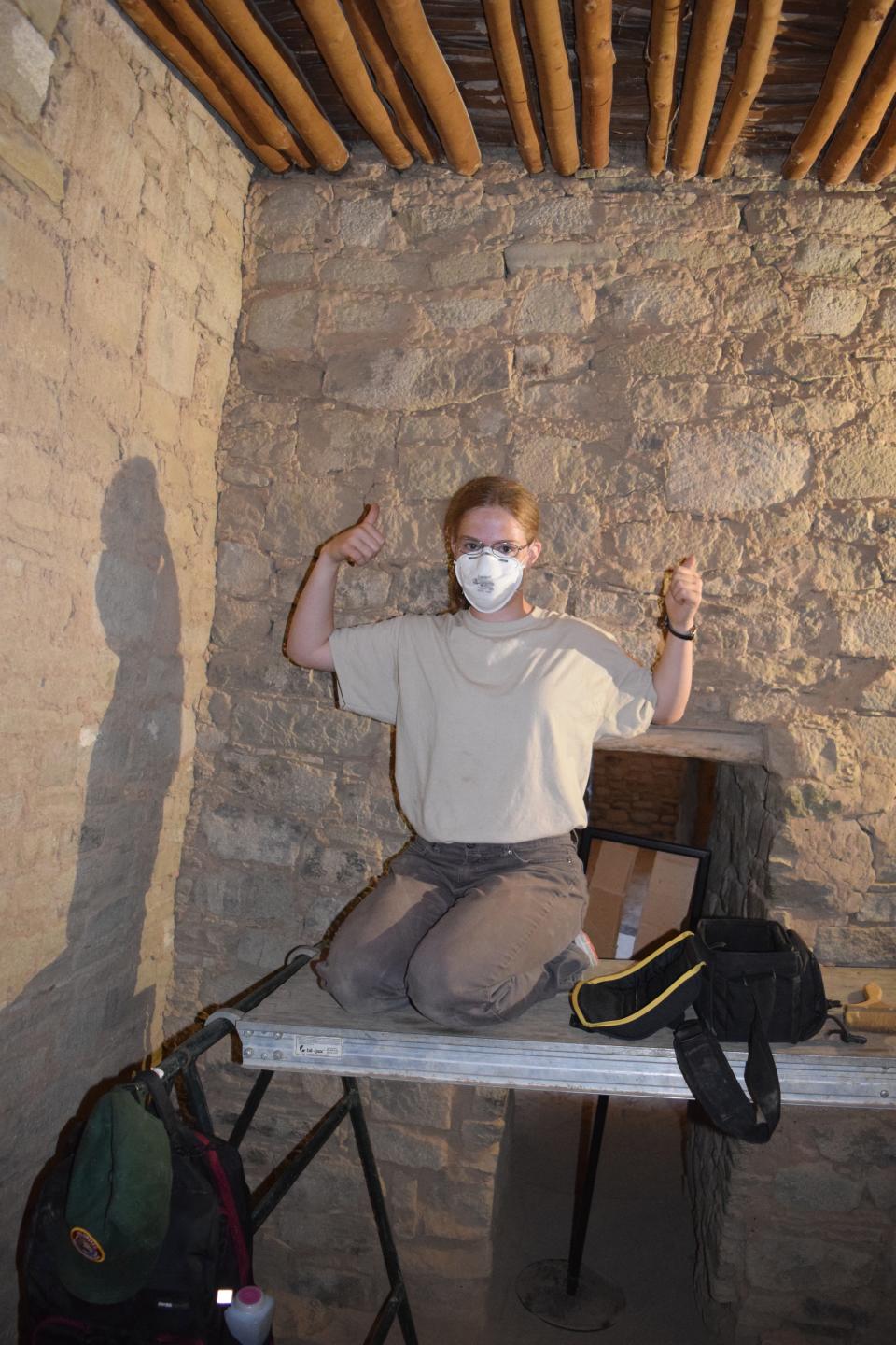 Moriah Sonnenberg celebrates after the first discovery of ancient Puebloan stealth art in one of the rooms at Aztec Ruins National Monument in 2019.