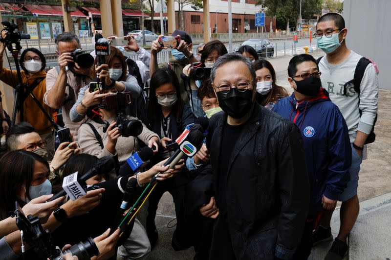 Pro-democracy activist Benny Tai reports to the police station over national security law charges, in Hong Kong