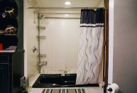 <p>Make sure you keep that shower curtain open, you never know what could hide behind it. (Airbnb) </p>