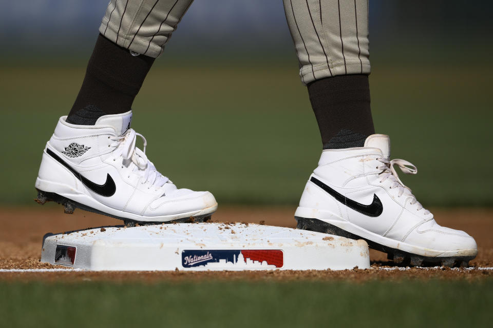 San Diego Padres' Fernando Tatis Jr. stands on third base during the third inning of the team's baseball game against the Washington Nationals, Thursday, May 25, 2023, in Washington. (AP Photo/Nick Wass)