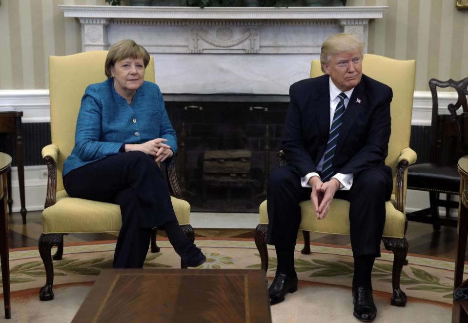 Donald Trump refused to shake Angela Merkel's hand on March 17 (AP)