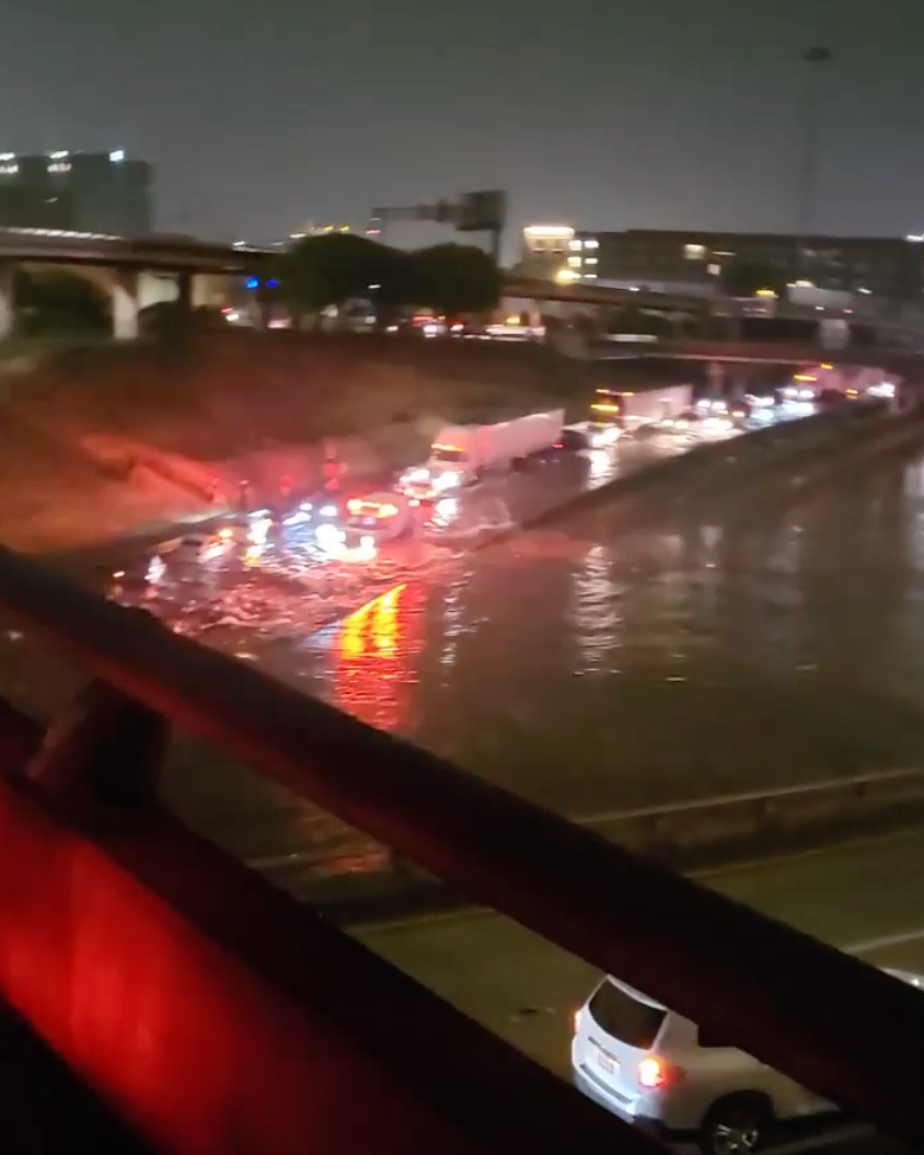 Cars stuck in floodwater as heavy rain fell in Dallas on Sunday. (Courtesy Tenika Fox)