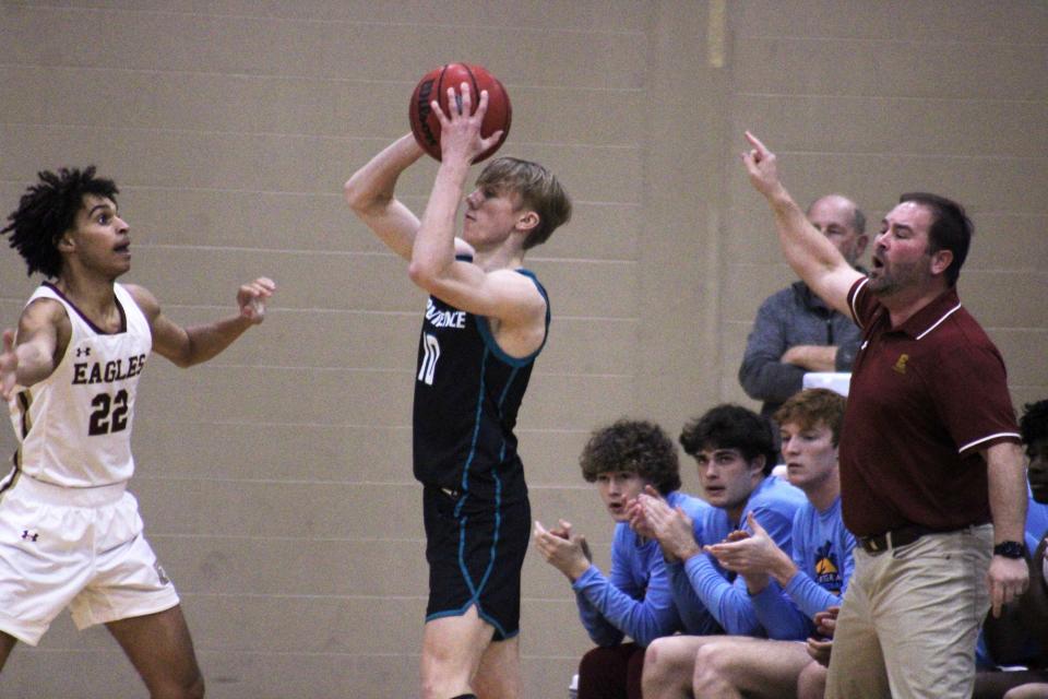 Providence guard Caleb McAbee launches a 3-point shot against Episcopal.