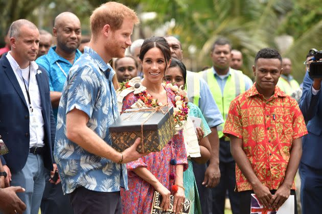 The royal couple receive a gift from the University of the South Pacific after Meghan recounts her own struggles to afford her university degree.